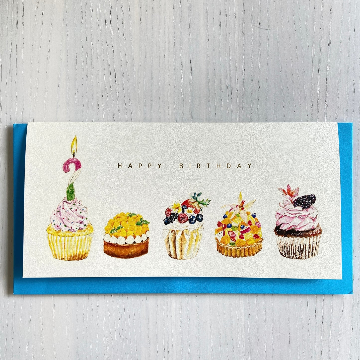 Homemade cupcake birthday card with an envelope